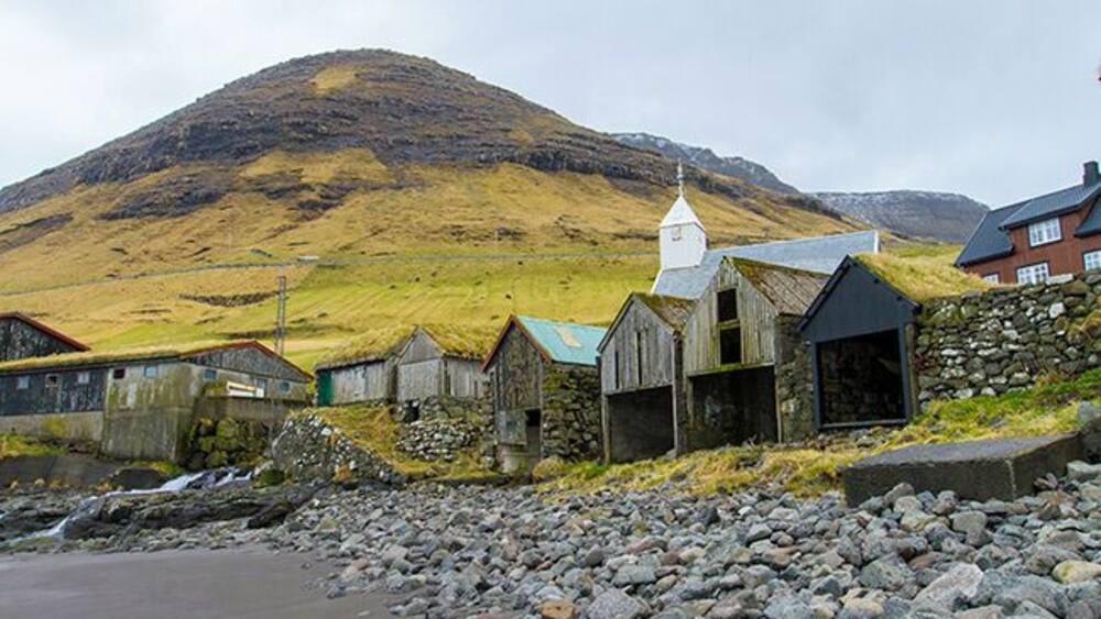 The genus of the famous author William Heinesen comes from the village Bour, which currently has around 75 inhabitants. The village has had a settlement since the Viking era and you get a wonderful view to the rocky island Tindholmur with its 5 peaks. Read more on: http://www.travelwithallsenses.com/faroe-islands-treat-for-all-senses/
