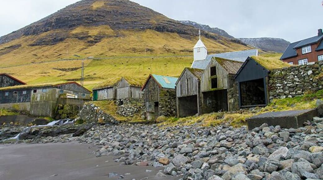 The genus of the famous author William Heinesen comes from the village Bour, which currently has around 75 inhabitants. The village has had a settlement since the Viking era and you get a wonderful view to the rocky island Tindholmur with its 5 peaks. Read more on: http://www.travelwithallsenses.com/faroe-islands-treat-for-all-senses/
