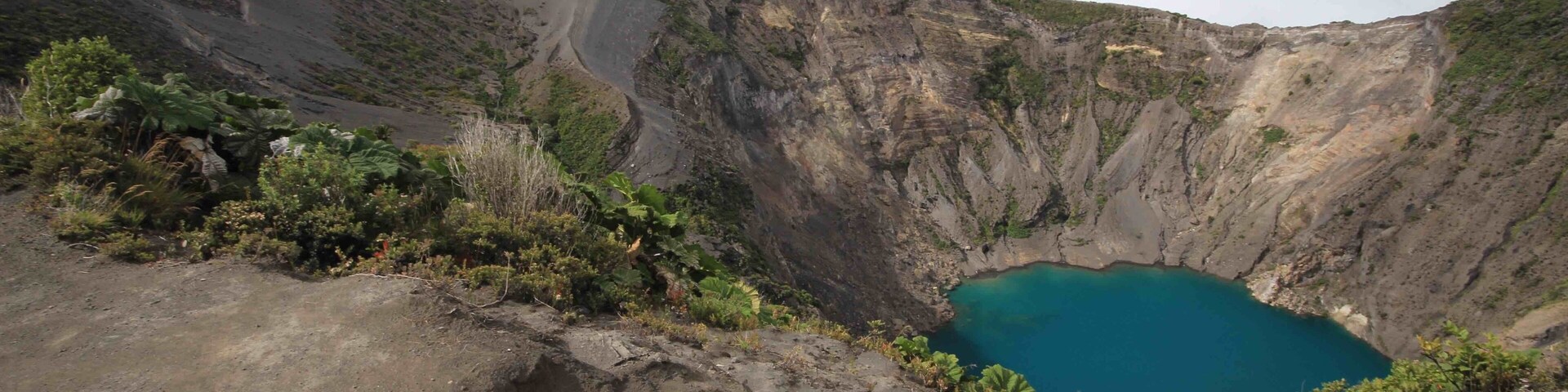 Irazu Volcano is a short trip from San Jose, Costa Rica. The drive up to the volcano's crater lookout takes you through some beautiful scenery around the Cartago area. Worth the drive on its own. As we ascended the volcano, the cloud cover moved in and totally blocked everything from view. They only moved out long enough to make our way to the view points and snap a couple pictures. Then it clouded back in. The volcano's summit is at 3432 meters (11,260 ft) and they say that on a clear day you can see the Atlantic Ocean and Pacific Ocean.
