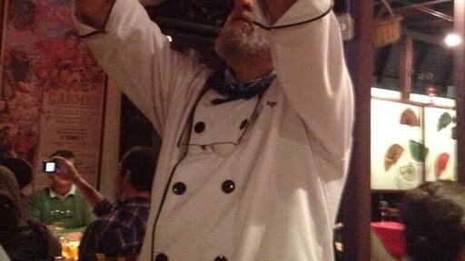 The owner of this Spanish restaurant, teaching us how to drink