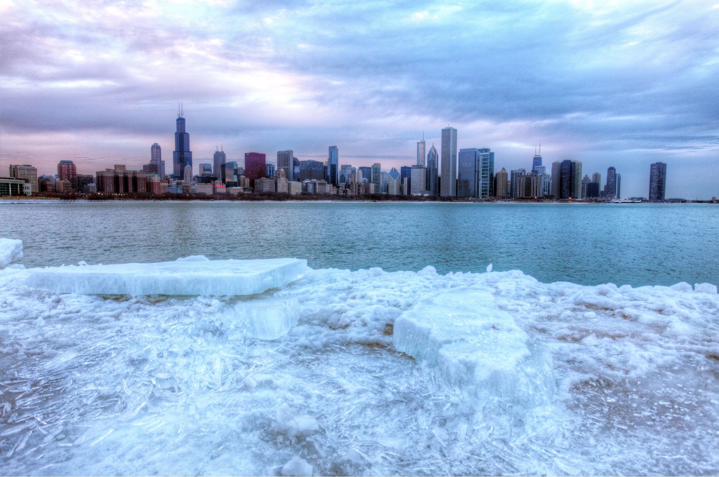 If you want some of the best views of the city take a walk out to the planitarium. It is directly across the bay from sears tower and the hancock building. I ventured down onto the crumbling ice sheet that went out about 30 feet into the bay. 