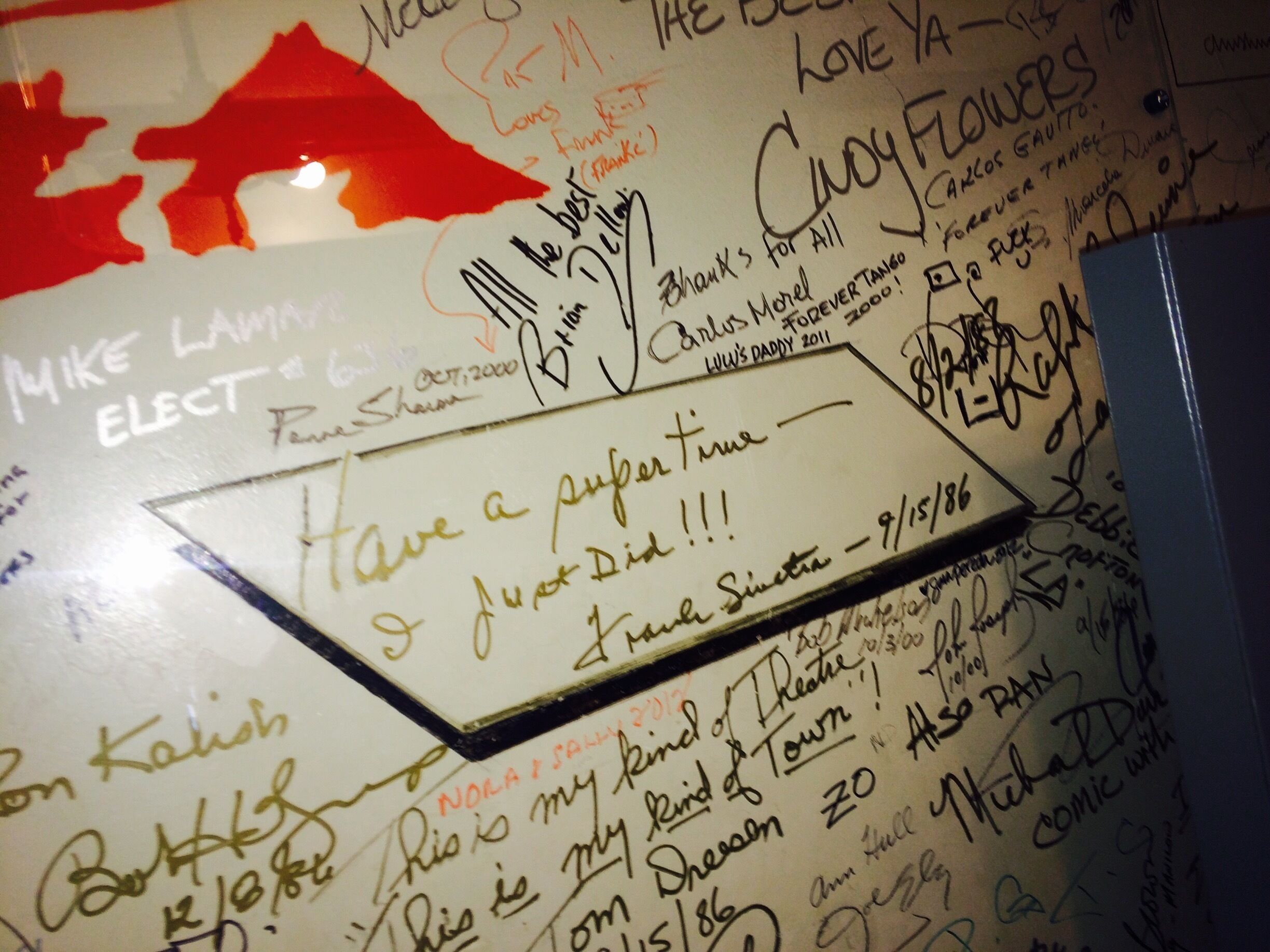 Autographs line the back staircase to the artists' waiting room.  Great history before you! 