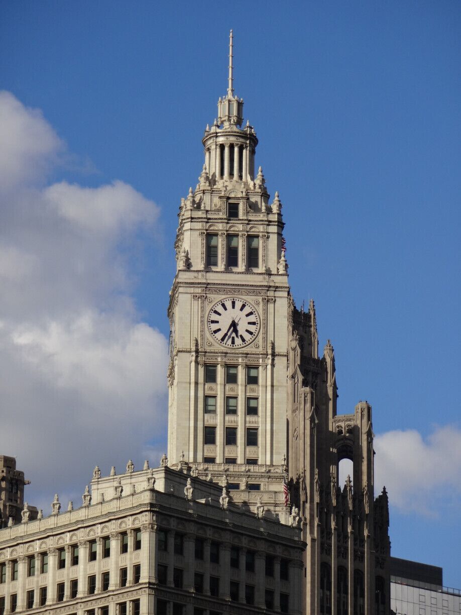 The first air conditioned office building in Chicago, the Wrigley Building. This is a close-up of the 30 story south tower completed in 1921. The tower has clock faces on all four sides each measuring nearly 20ft in diameter. 