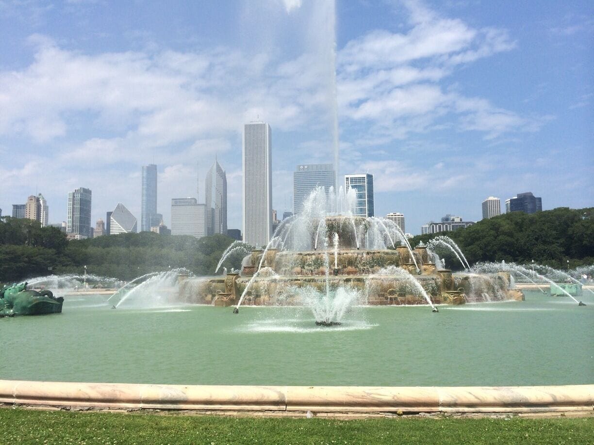Beautiful fountain in Grant Park with the city in the background. It is one of the largest fountains in the world and draws symbolism from Lake Michigan.