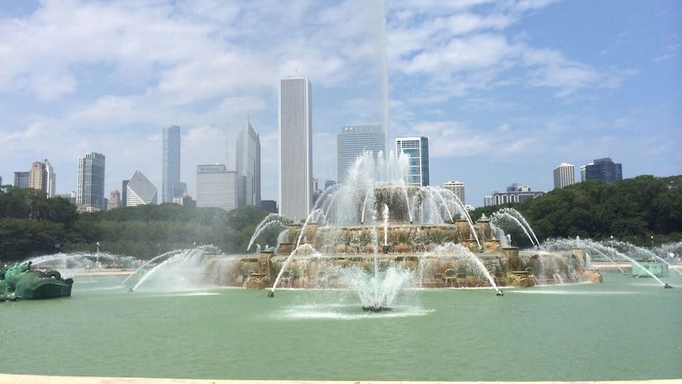 Beautiful fountain in Grant Park with the city in the background. It is one of the largest fountains in the world and draws symbolism from Lake Michigan.