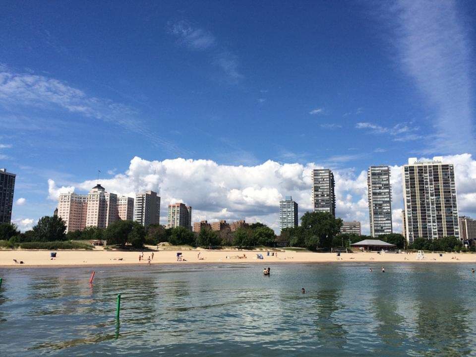 From the gay beach at Kathy Osterman Beach looking towards Chicago's Edgewater neighborhood! On the left is remaining building of the historic Edgewater Beach Hotel complex! #LifeAtExpedia