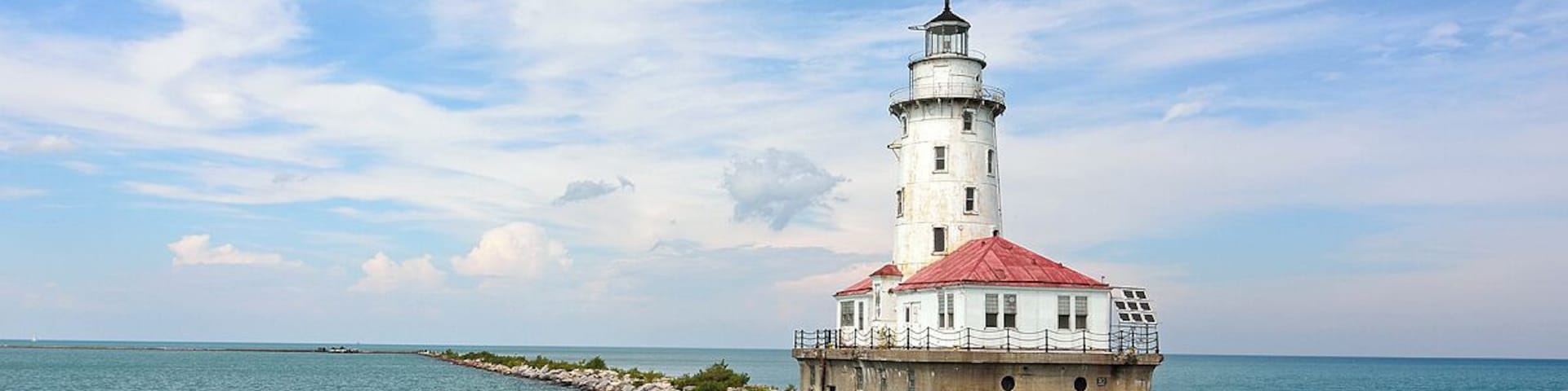 The lighthouse just off the end of navy pier in Chicago.