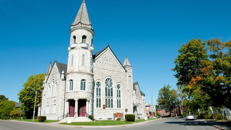 A large, historic church with a prominent steeple and multiple towers.
