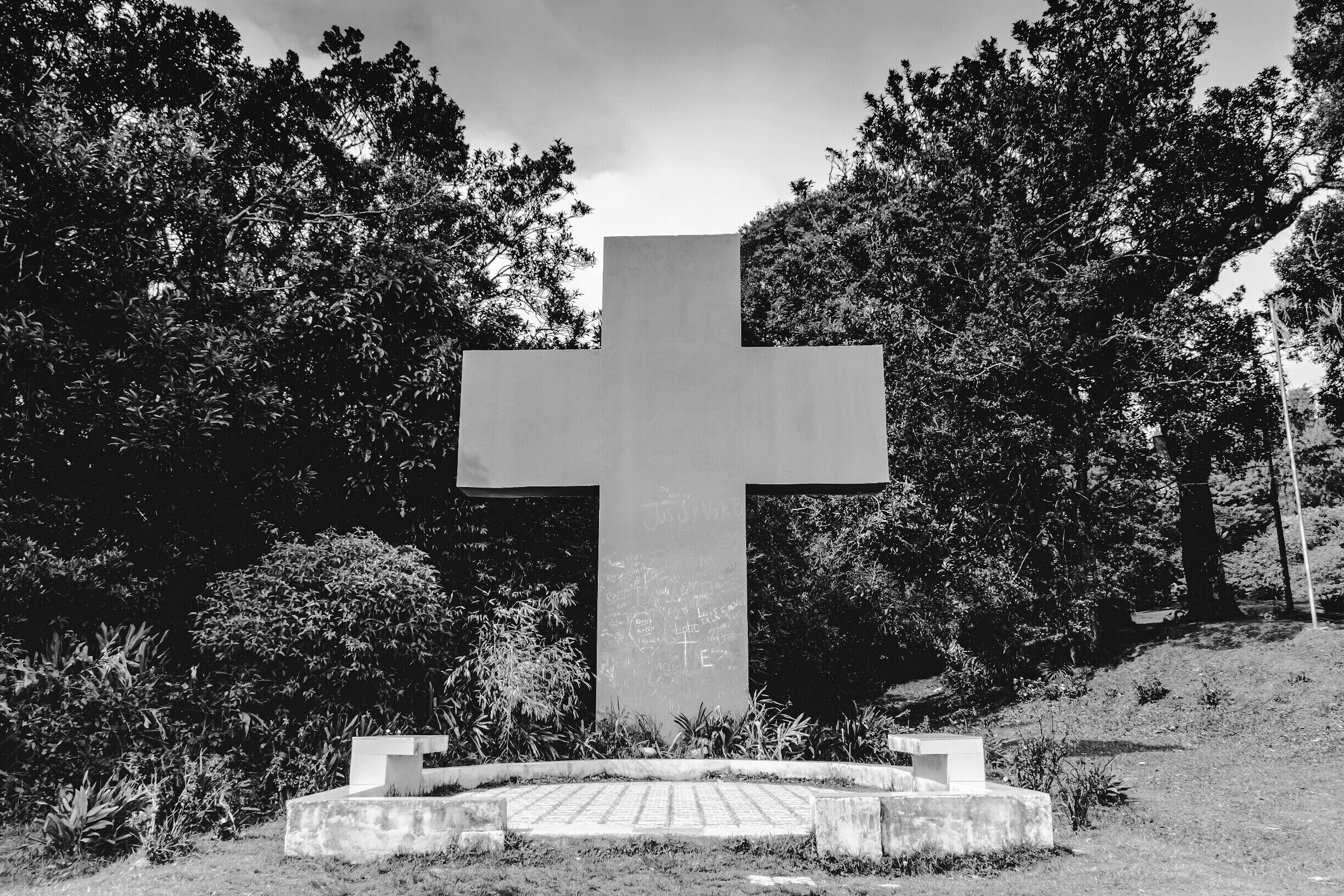 The Cross and the chromatic mosaic floor  was part of a small temple that was built in 1932-1933 and was demolished in 1970, leaving it as a symbol to commemorate the  place.