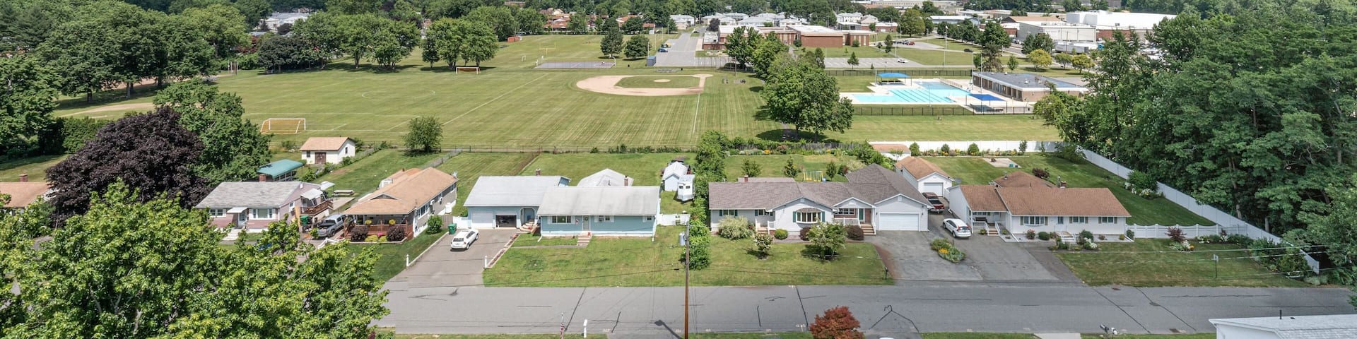 Aerial view of a rural residential area with a variety of homes in Chicopee, Massachusetts