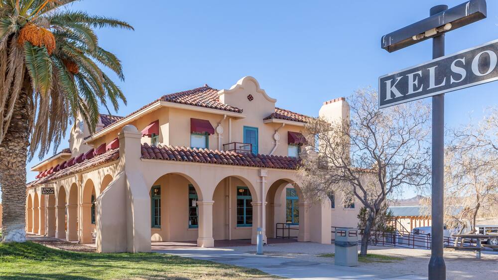 A building with arches and a sign that reads 'KELSO.'