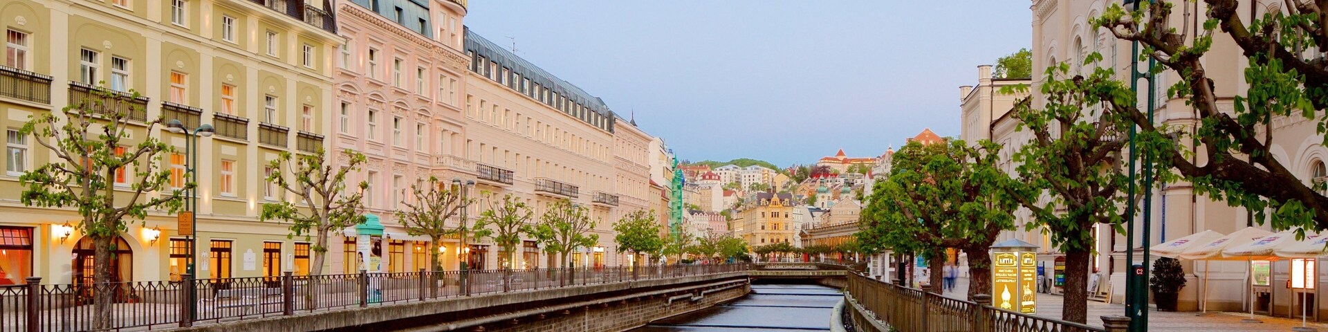 Karlovy Vary which includes a river or creek and a city
