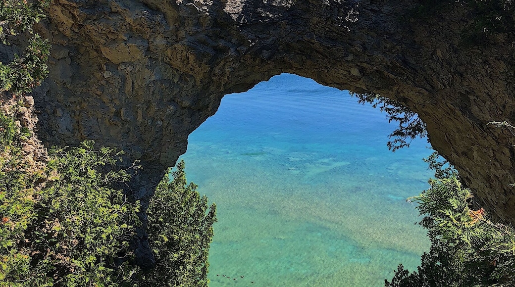 Arch rock overlooking beautiful lake Heron on Mackinac Island