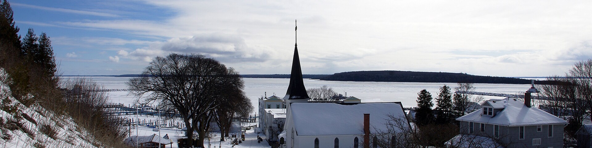 The island is a summertime tourist mecca.  However in the Winter there are only a few hundred permanent residents on the island.  The only reliable transportation this time of year is to fly, that is weather conditions permitting.  Beautiful to be there if you don't mind the cold and snow.