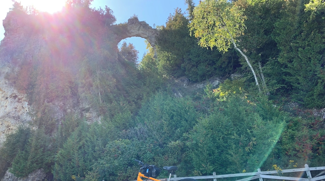 Arch rock with the sun setting behind it.
#LifeAtExpediaGroup