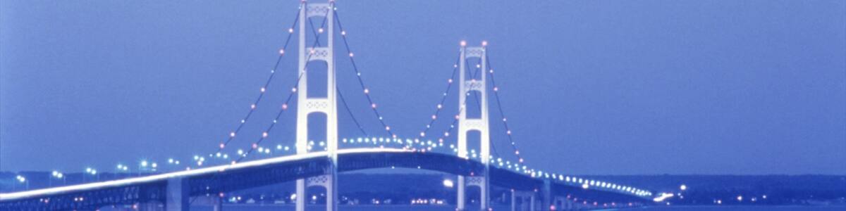 Mackinac Island featuring night scenes, island images and a bridge