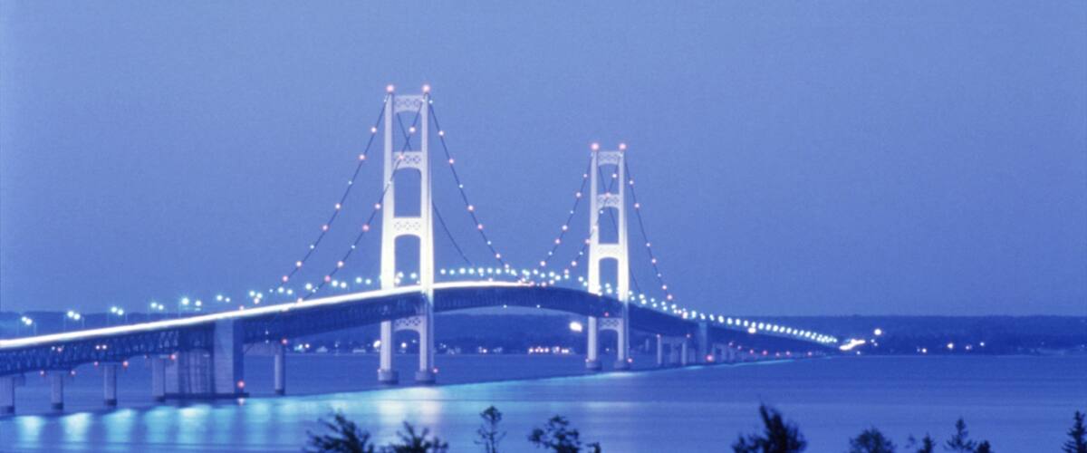 Mackinac Island featuring night scenes, island images and a bridge