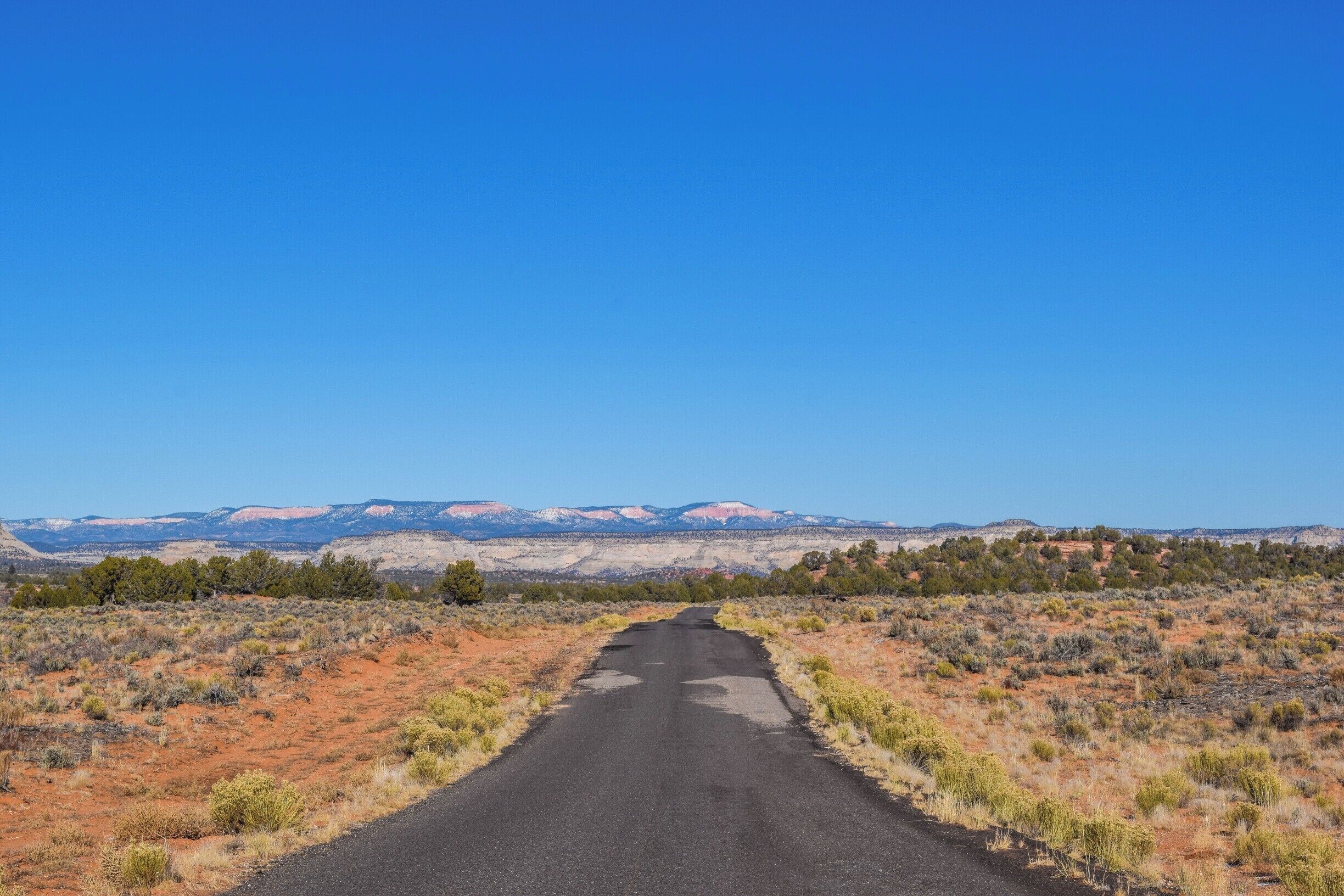 This was the road leading out of the Coral Pink Sand Dunes State Park in Utah. I never actually saw the coral pink sand dunes or the state park part. I don't think I drove far enough down the road on the little detour. It was still a stunning and beautiful sight nonetheless. 