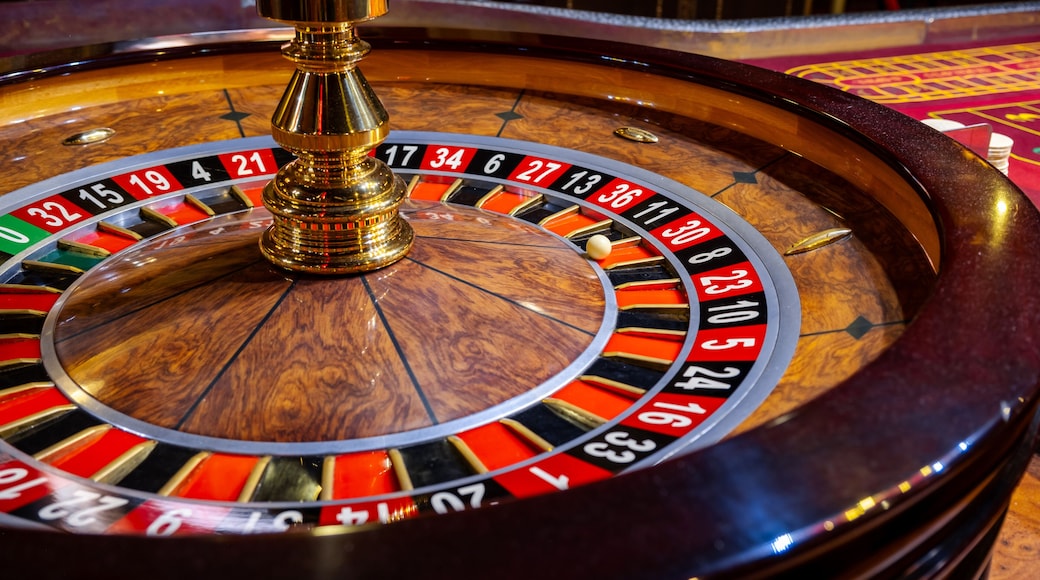 Roulette wheel. Casino. Gambling game. Roulette wheel on table in a casino. Roulette. The game in the casino. The concept of expectation of good luck.