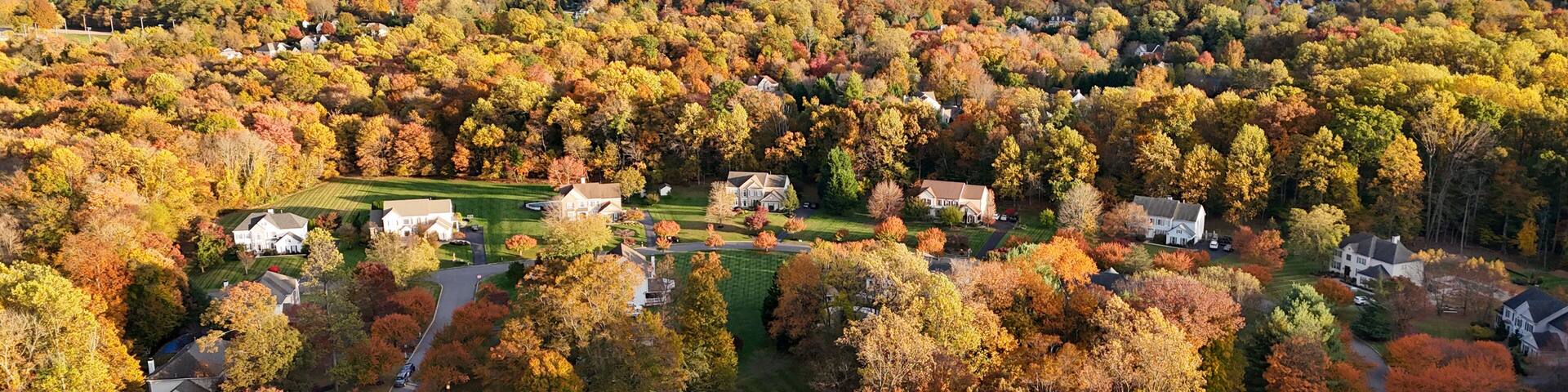 Aerial view of colorful autumn neighborhood in Garnet Valley, Pennsylvania suburb near Philadelphia