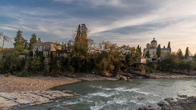 The Rioni River embankment in the city Kutaisi, Georgia. Sunset cityscape