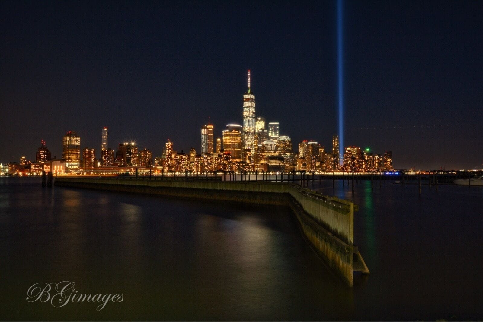 Taken from Newport waterfront. 9/11 tribute. #waterlust #colorful #landscape #cityscape #citylife #nightscape #architecture #I❤️NY #nyc #freedomtower #Nikon #NikonD7100 #Manfratto tripod #longexposure 