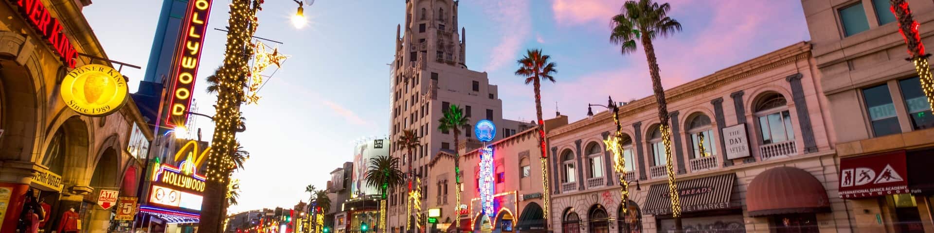 Hollywood featuring a sunset, a city and street scenes