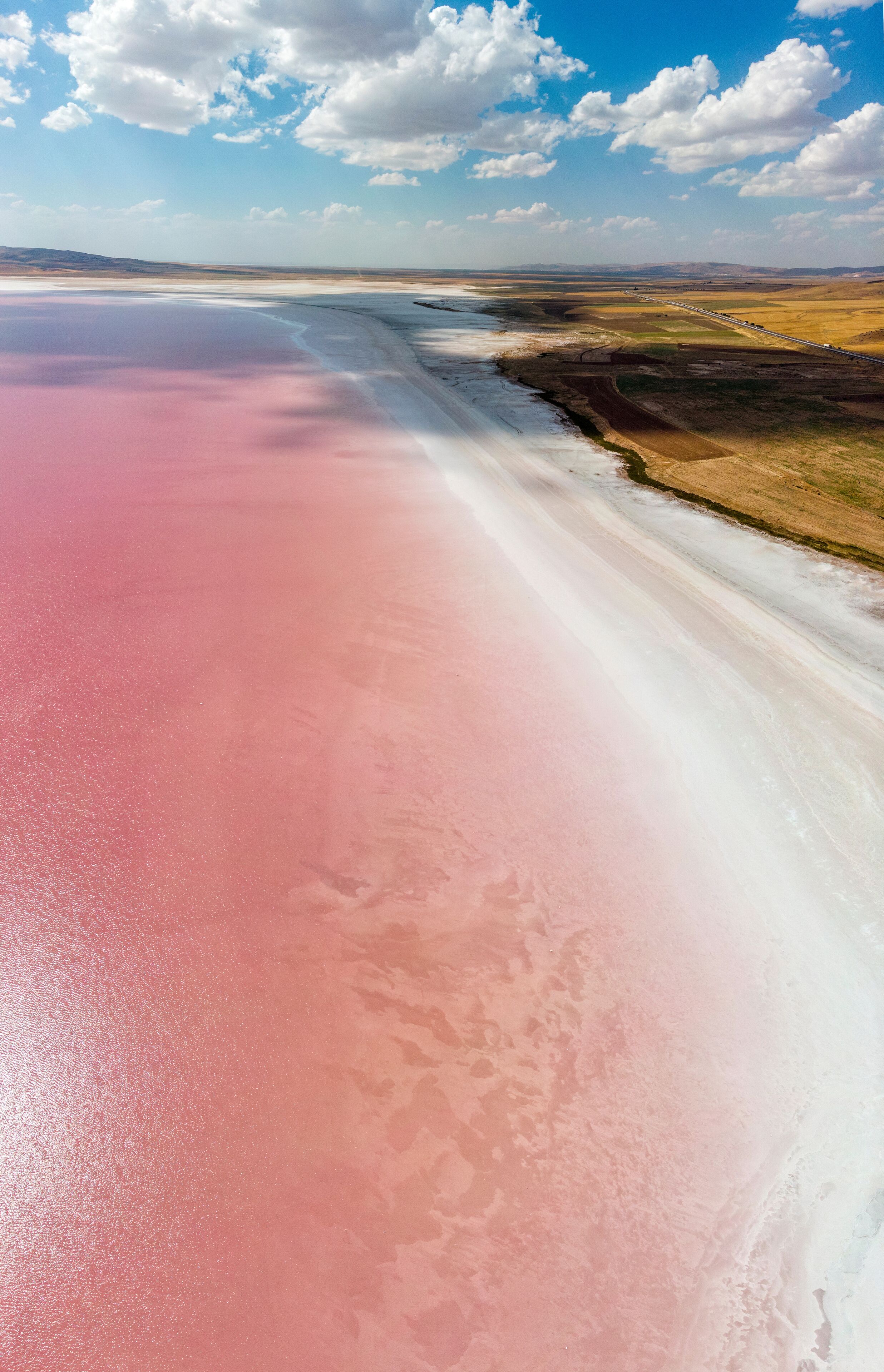 Aerial view of Lake Tuz, Tuz Golu. Salt Lake. Red, pink salt water. It is the second largest lake in Turkey and one of the largest hypersaline lakes in the world. It is located in the Central Anatolia