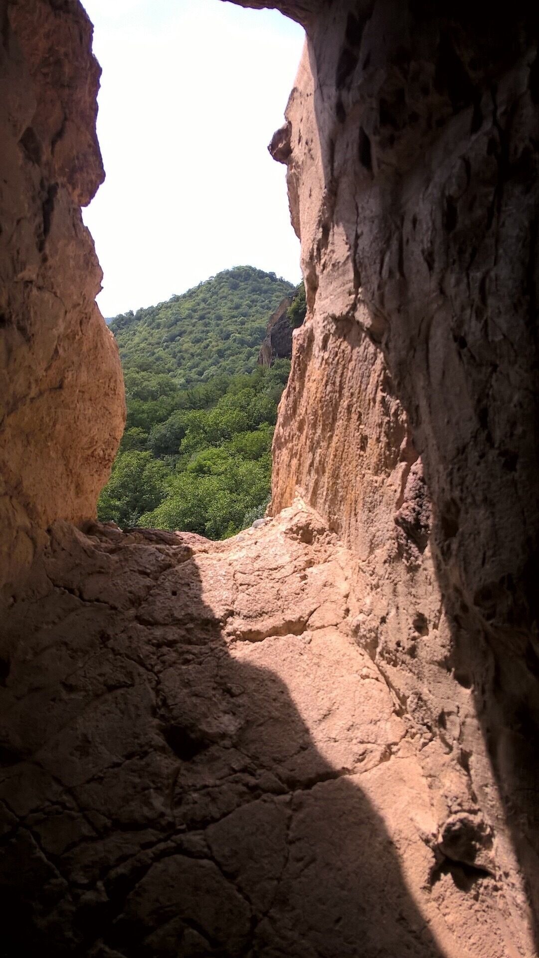Looking out from inside of an old fortress called Khuluti in the country of Georgia. 