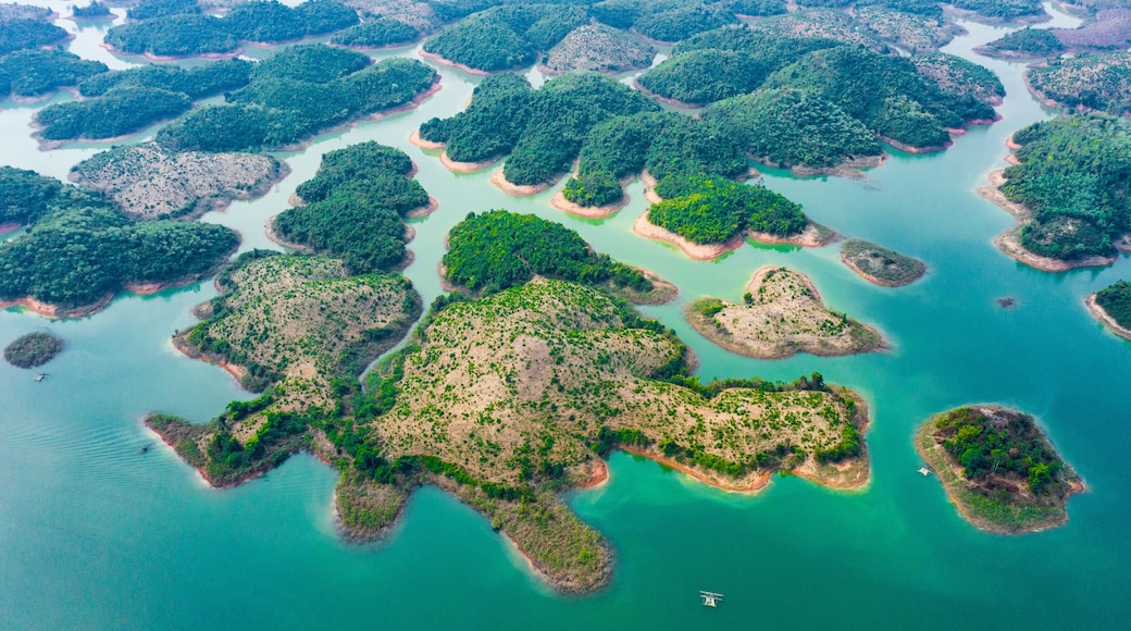 (View from above) Stunning aerial view of a beautiful group of island in Nam Ngum Reservoir in Thalat located in northern Laos.