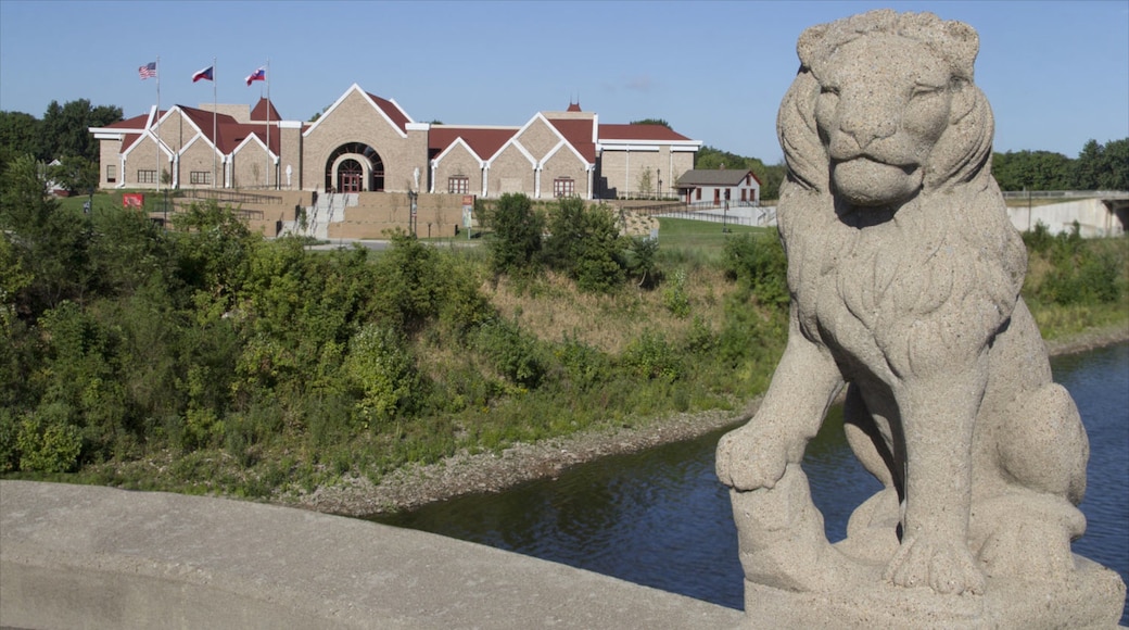 Cedar Rapids which includes a small town or village, a statue or sculpture and a river or creek