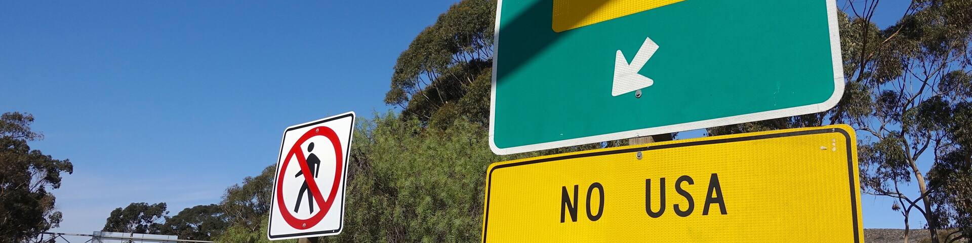 Deportation concept - signs near US-Mexican border