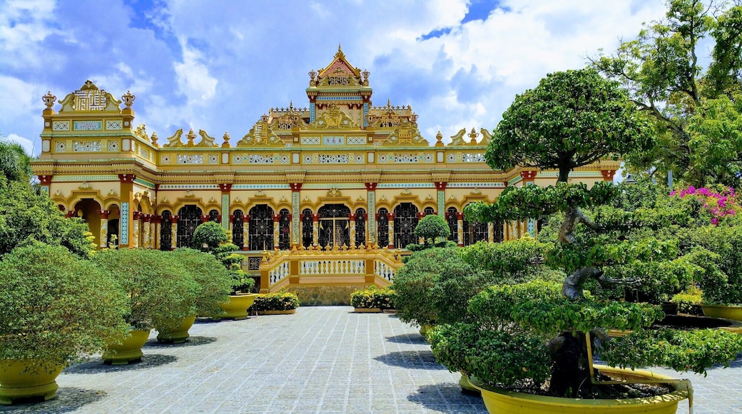 Chua Vinh Trang Pagoda, My Tho, Mekong Delta, Vietnam
This Pagoda stands in beautiful garden surroundings. There are also some big Buddah statues including a huge Happy Buddah, and other temples to see here. #packsandaplan