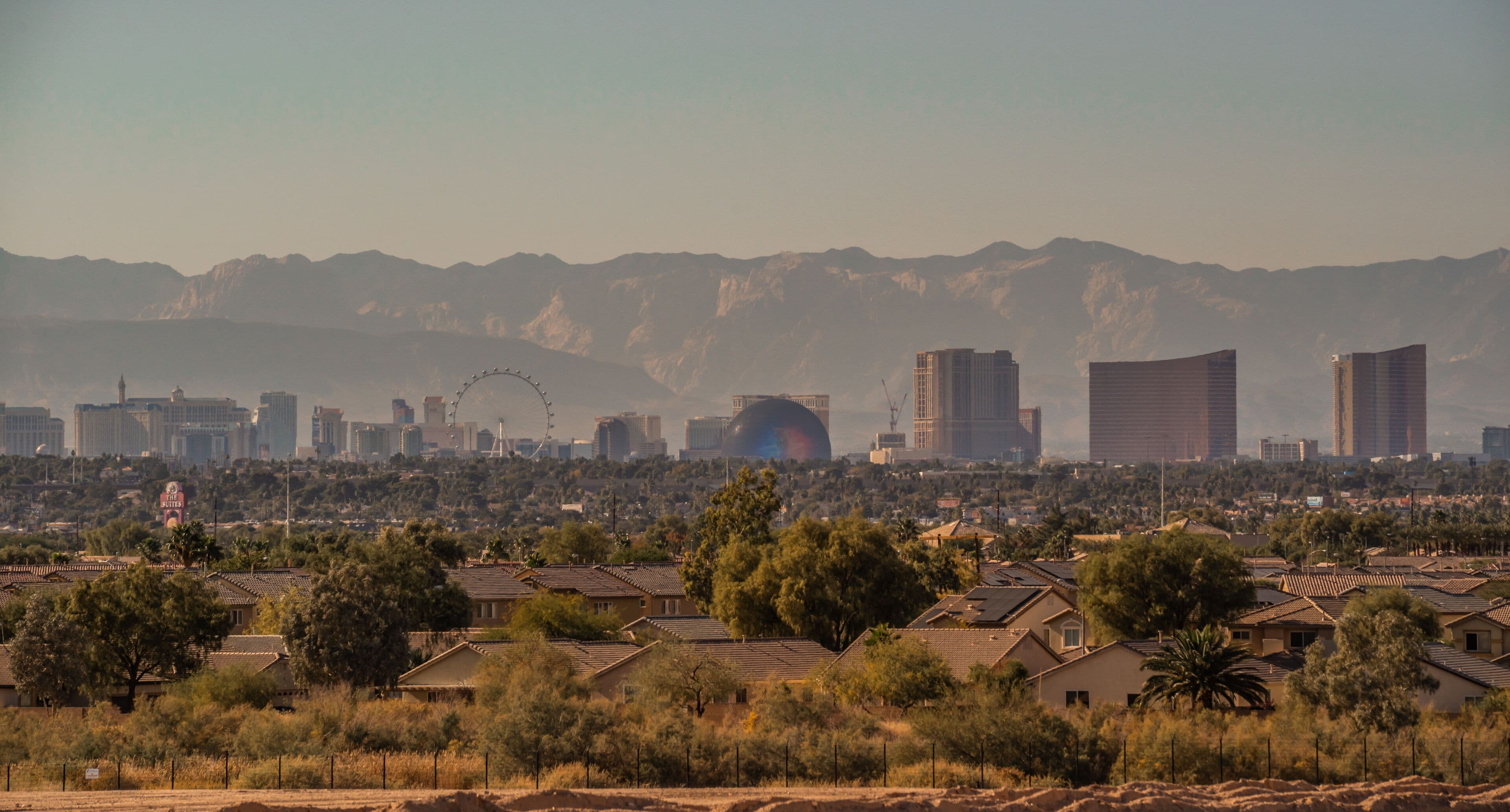  Las Vegas Nevada Skyline with Stratosphere Tower and Desert Mountain Backdrop from Daylight to Sunset and Night