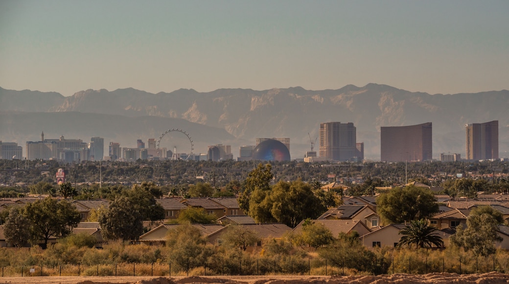 Las Vegas Nevada Skyline with Stratosphere Tower and Desert Mountain Backdrop from Daylight to Sunset and Night