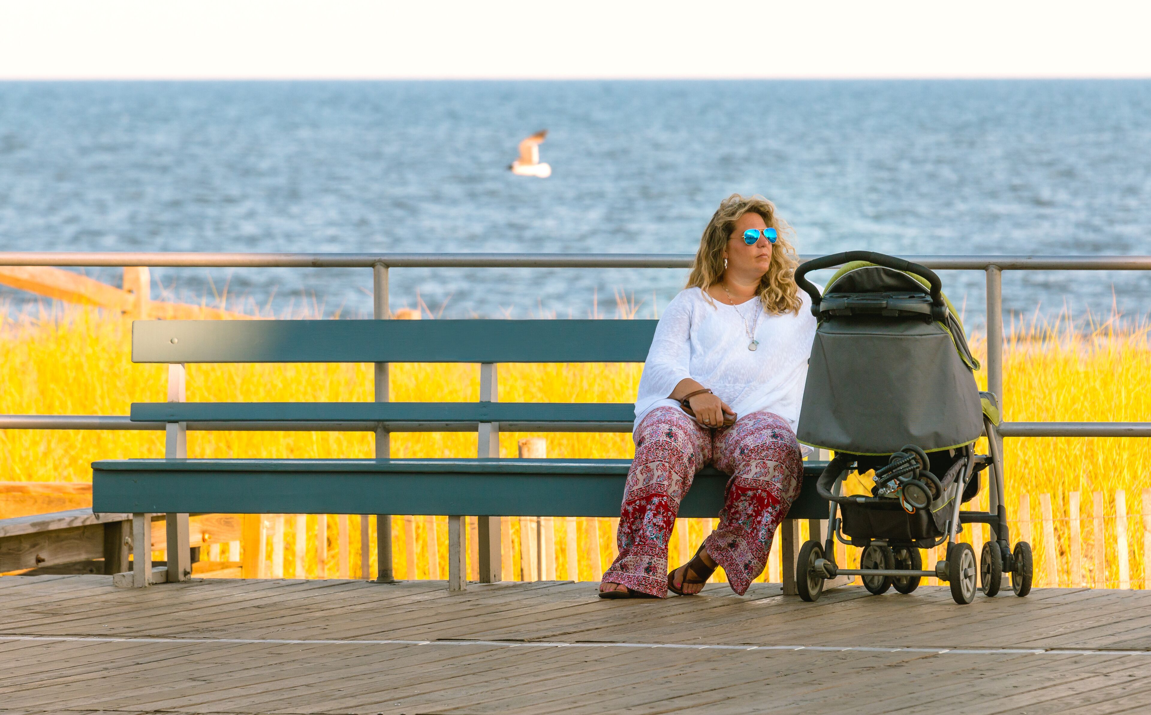 Women on Beach Boardwalk