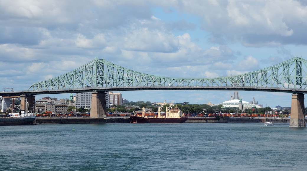 The Jacques Cartier Bridge is a steel truss cantilever bridge crossing the Saint Lawrence River from Montreal to Longueuil in Montreal, Quebec, Canada