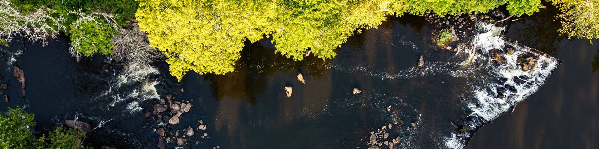 Aerial view featuring Wamesit Falls in Lowell, Massachusetts