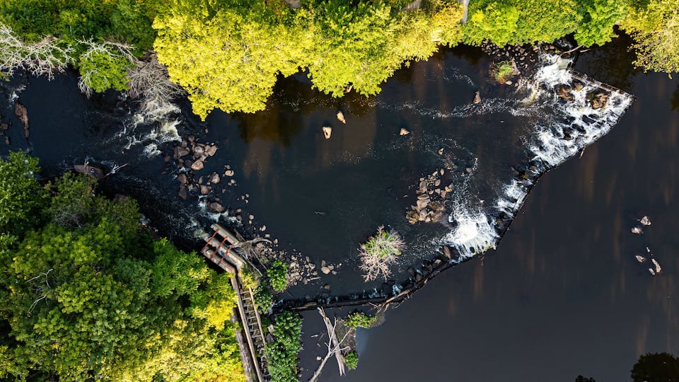 Aerial view featuring Wamesit Falls in Lowell, Massachusetts