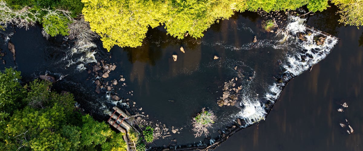 Aerial view featuring Wamesit Falls in Lowell, Massachusetts