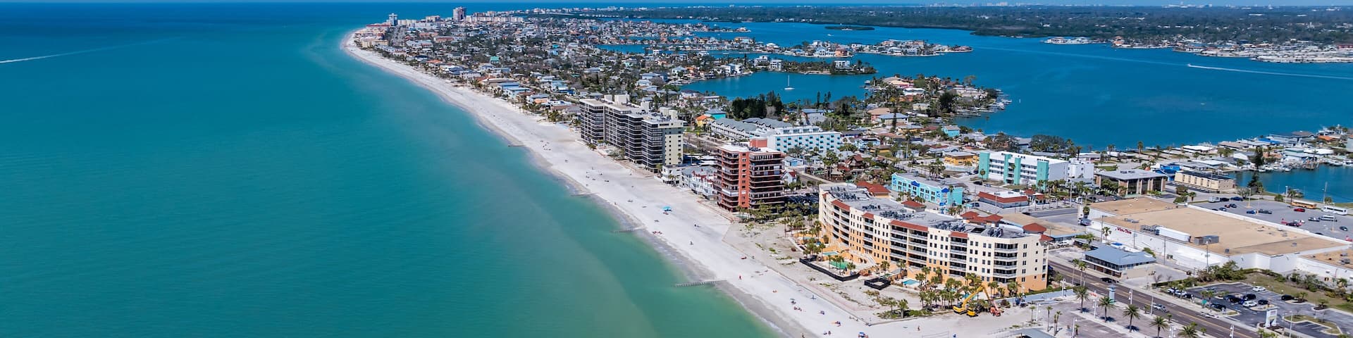 Madeira Beach, FL, USA - 02-23-2025: Winter aerial image of the vacation beach community, Madeira Beach, on the Gulf of Mexico.