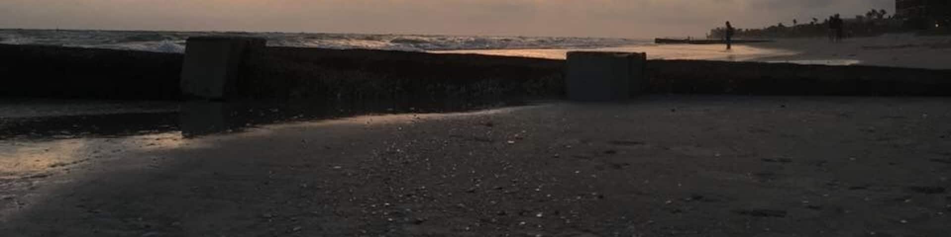 sunset silhouette silliness... grab a bite to eat or something to drink from The Snack Shack right on the beach and wait for the sunset, I typically prefer the light and colors actually after the sun has gone below the horizon... meter parking just a few feet from the sand with fresh water spigots to rinse off the sand and salt afterwards