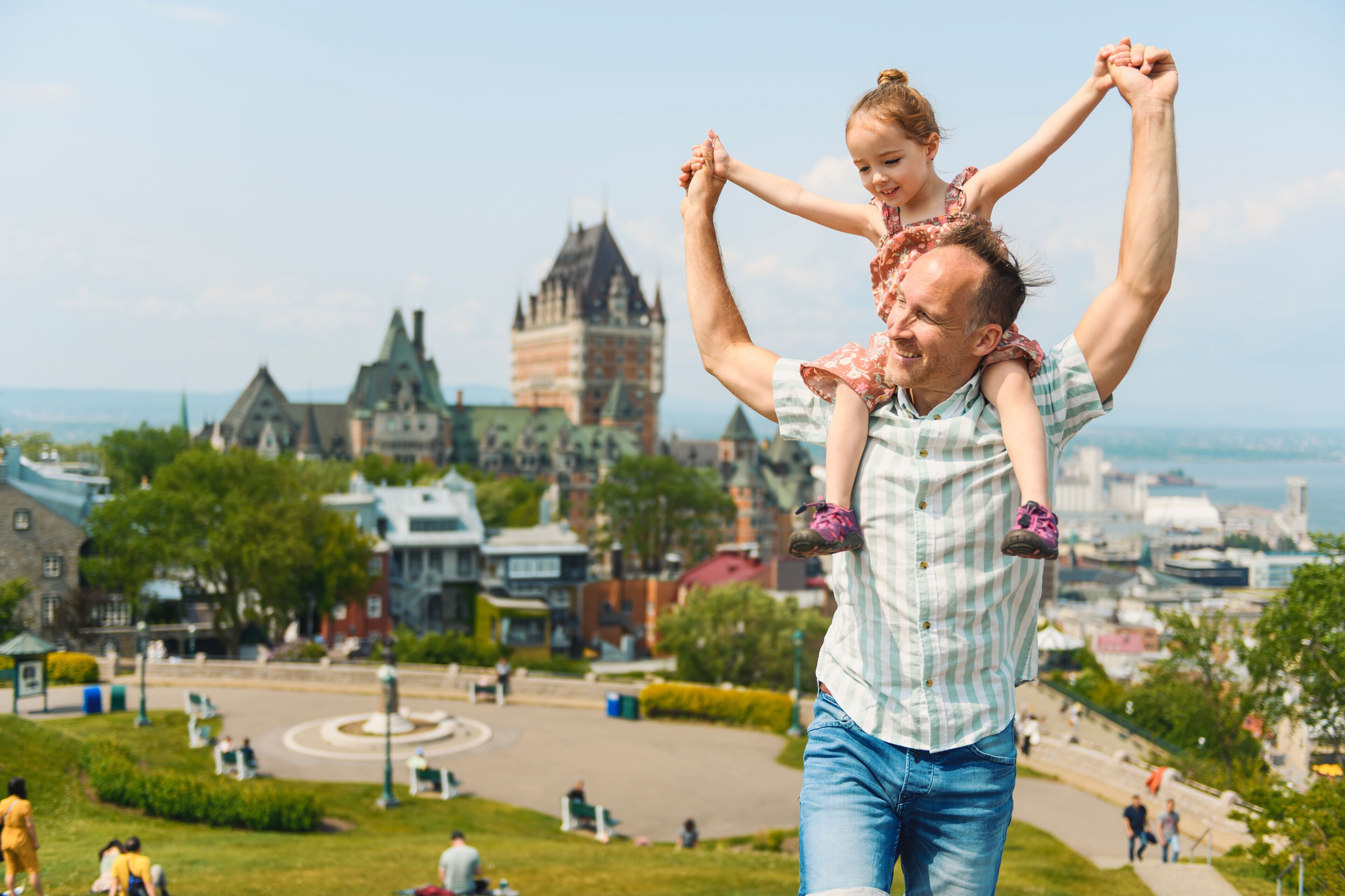 father and daughter in summer season in quebec city
