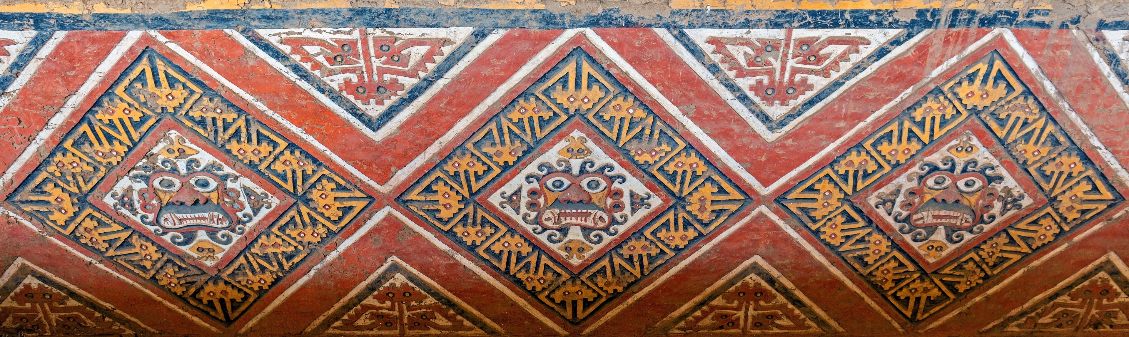Bas relief Panorama of the Moche God Ai Apaec in a tomb of the Huaca de la Luna, Trujillo, Peru. Ai Apaec was worshiped as the creator god, protector of the Moche civilization.