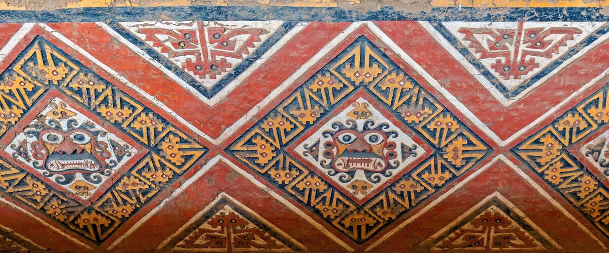 Bas relief Panorama of the Moche God Ai Apaec in a tomb of the Huaca de la Luna, Trujillo, Peru. Ai Apaec was worshiped as the creator god, protector of the Moche civilization.