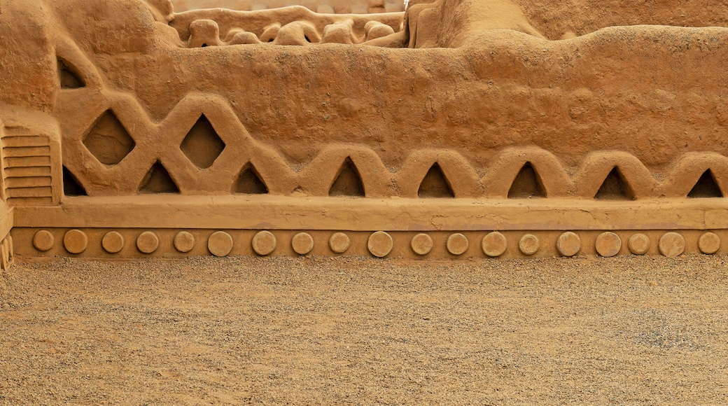 Panorama of the adobe walls and decorations in the archaeological site of Chan Chan made by the Chimu civilization near Trujillo, Peru.