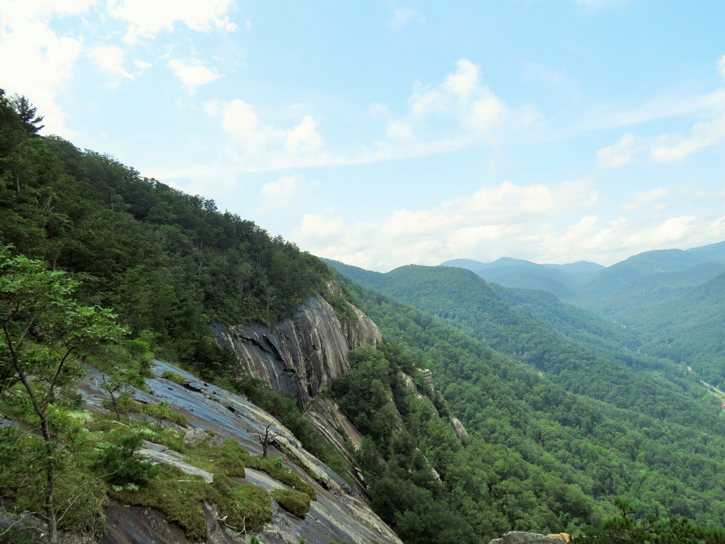 You can get a gorgeous view at the end of the Skyline Trail in Chimney Rock State Park. A popular trail so it is well maintained and pretty moderate to hike. 