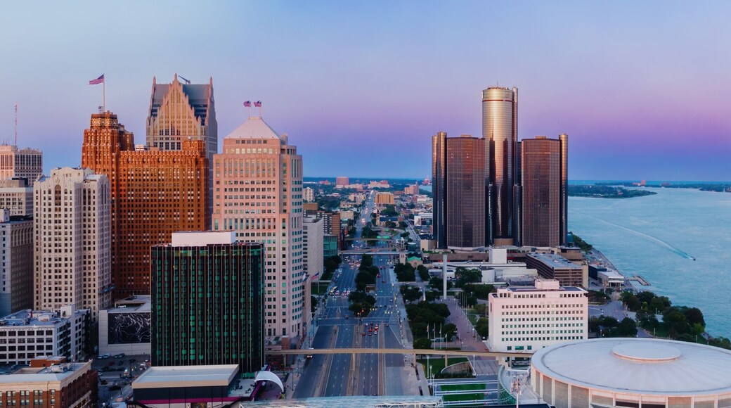 Detroit skyline at dawn, showcasing iconic skyscrapers and the Detroit River. Urban landscape. DOWNTOWN, DETROIT, MICHIGAN, UNITED STATES