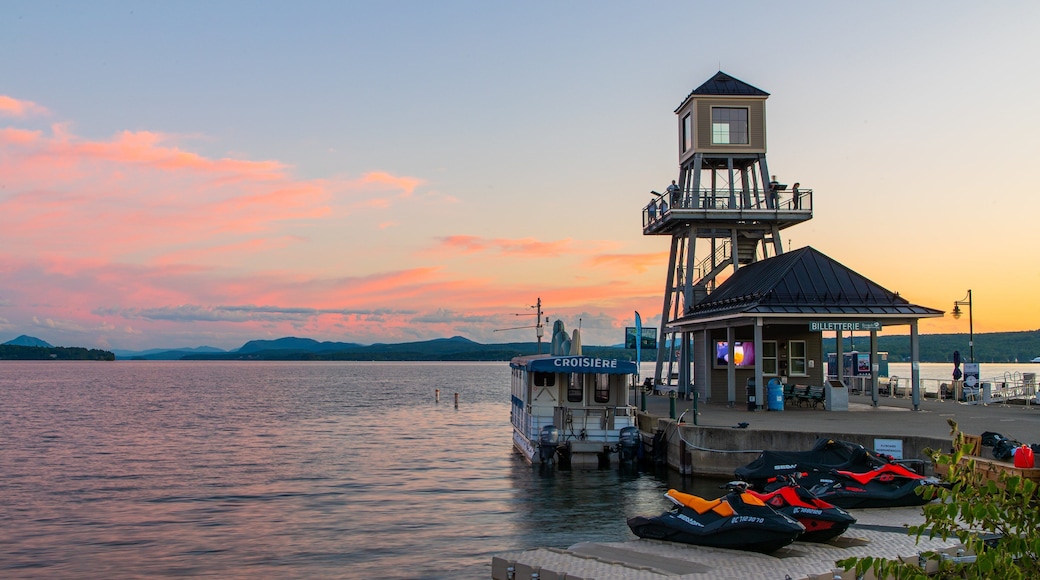 Magog showing a sunset, general coastal views and views