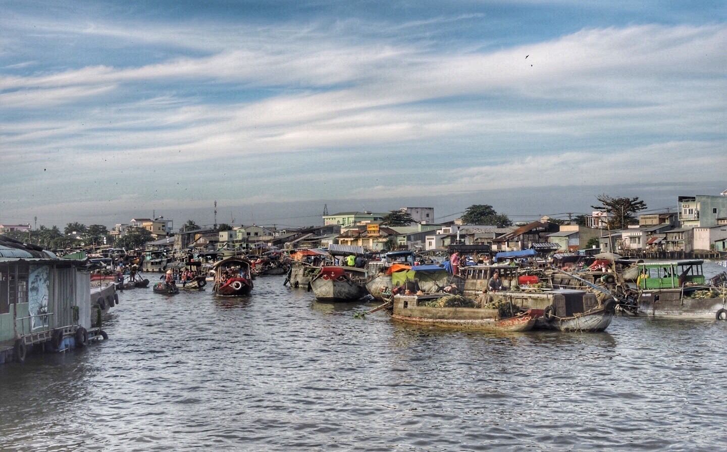 The floating market in Can Tho. Very crowded of sellers and buyers from 5 till 7 am.